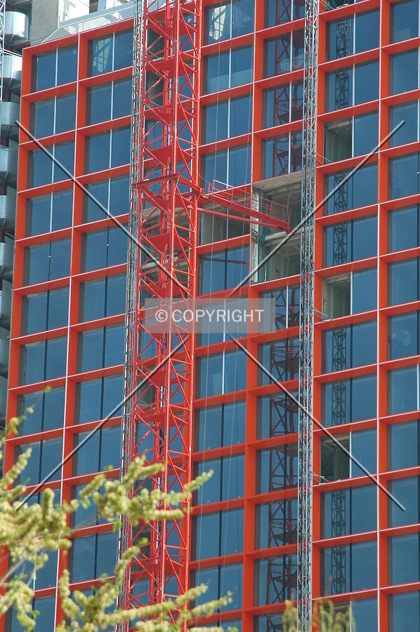 Orange aluminium facade nearly finished