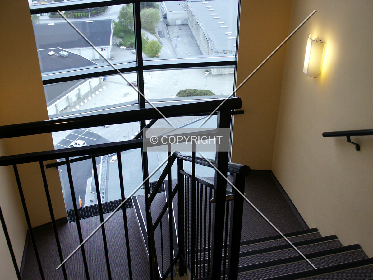 Looking down the stairway from the top floor