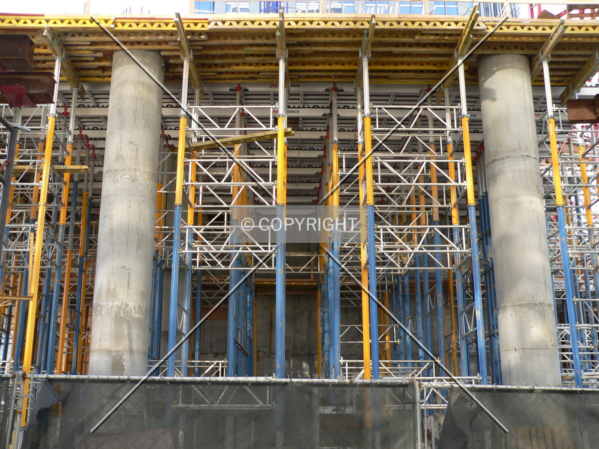 Scaffolding in the lobby level holding formwork for the next concrete pour