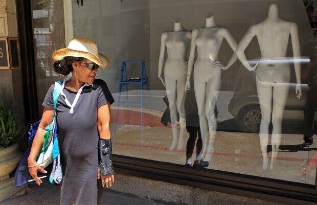 Renata Heard, 51, from St. Louis, standing outside after hearing that Macy's was going to close; May 20, 2013