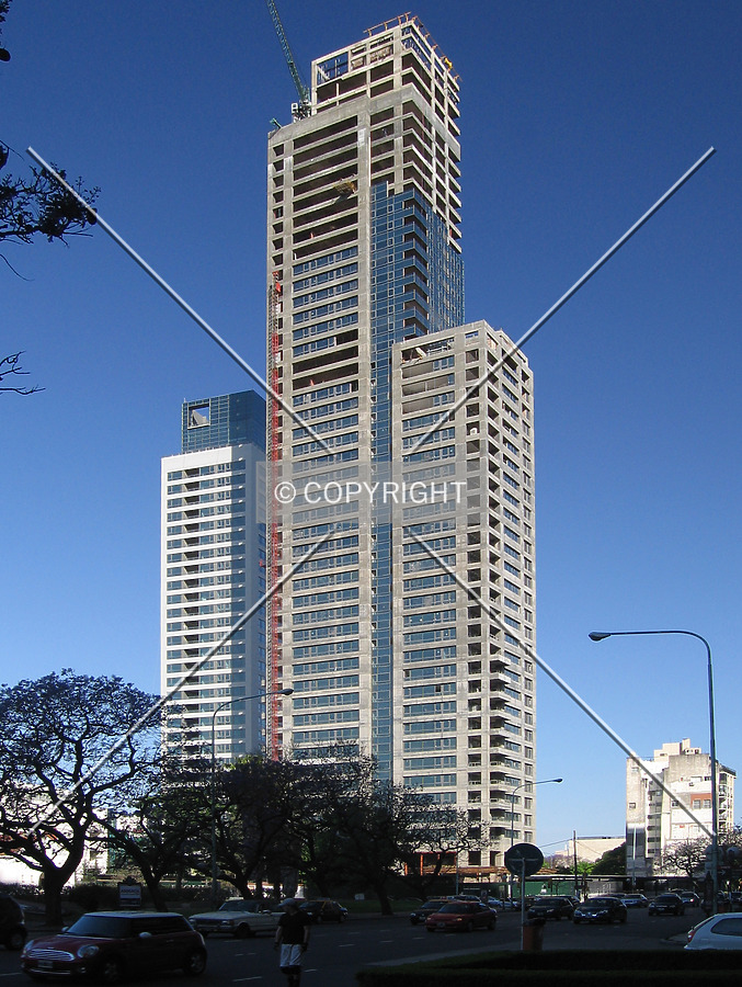 The curtain wall rises