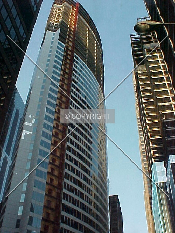 Looking up with 111 South Wacker Drive under construction to the right