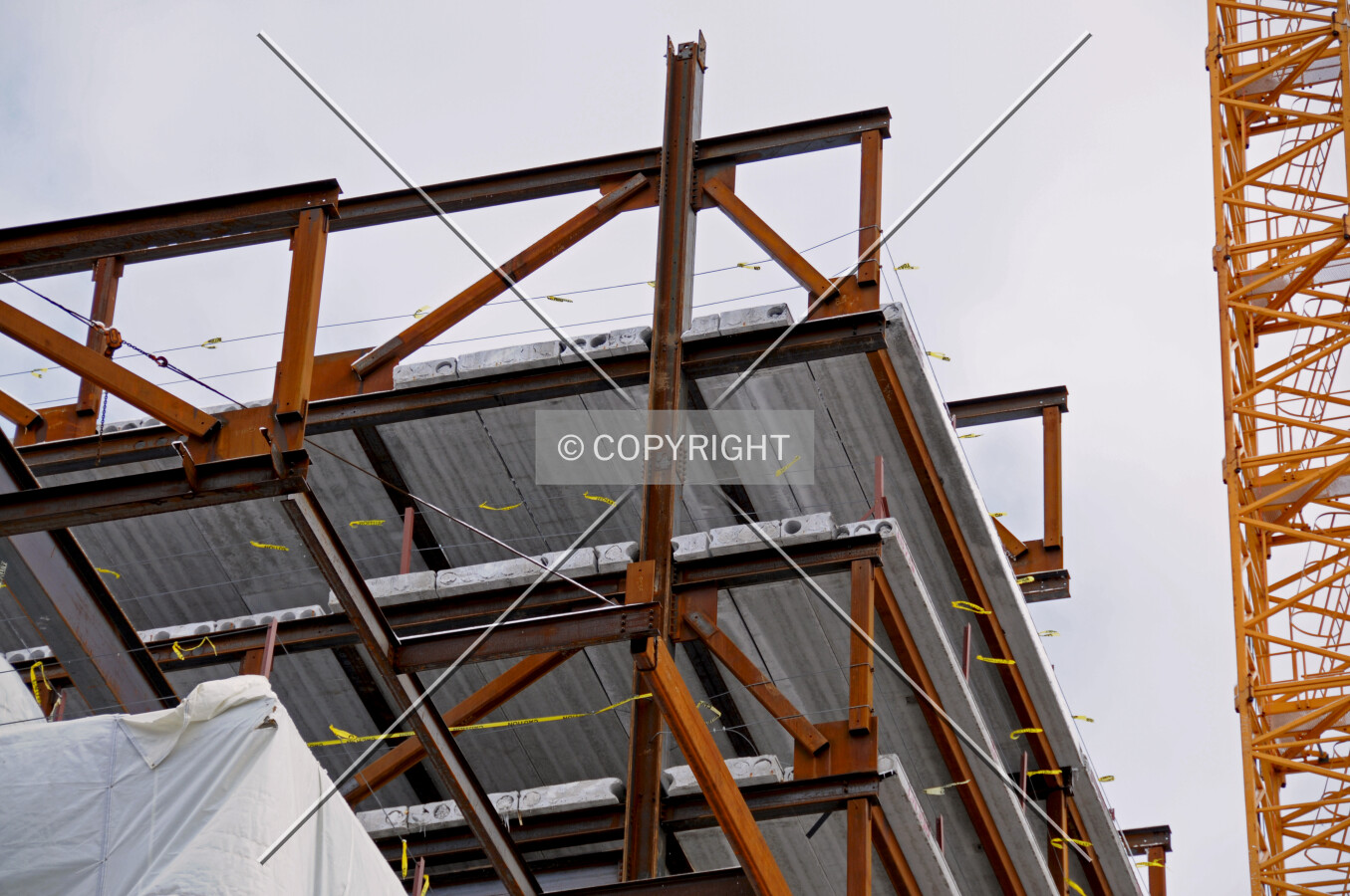 Steel trusses and precast concrete slab sections on the southwest corner of the tower