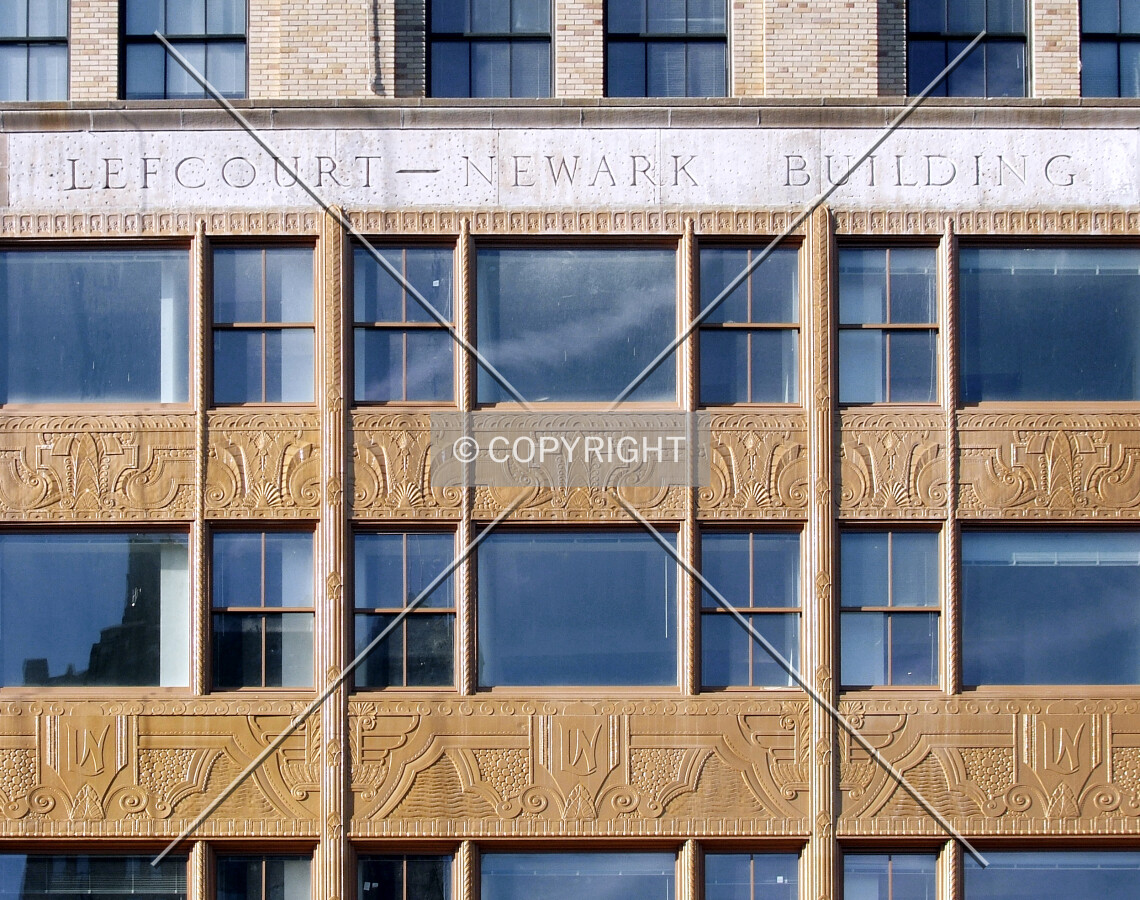 Facade details near the base of the building on Raymond Boulevard