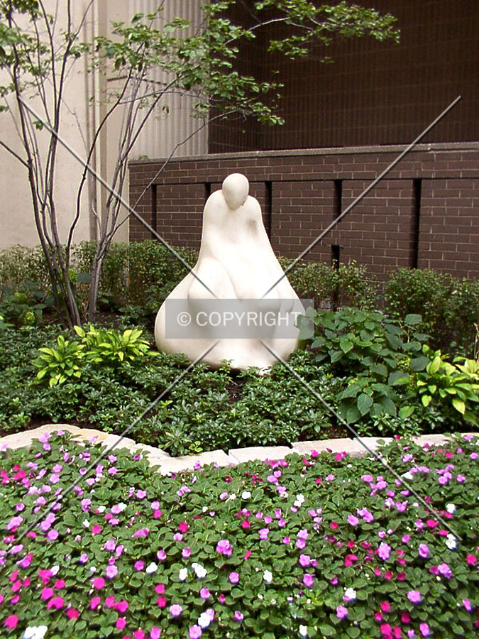 Vittore Bocchetta sculpture left of the entrance