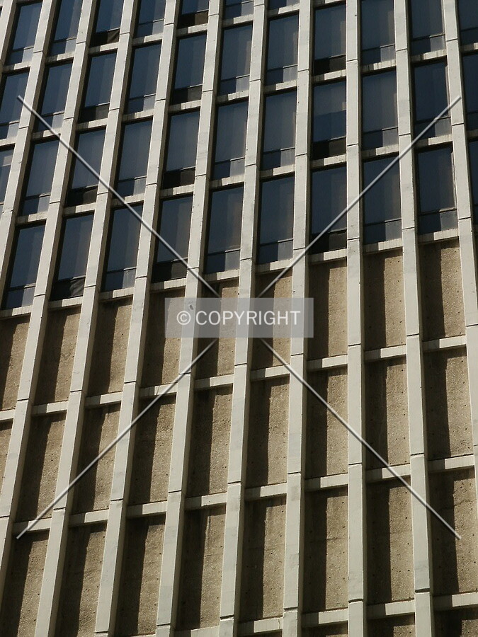 Facade at the transition from garage to condominiums