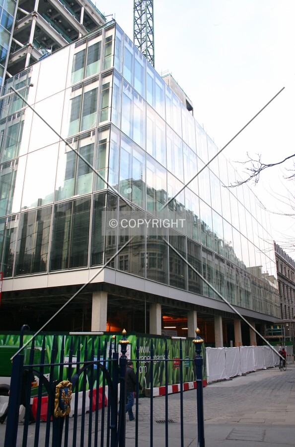 Looking up the southeast corner and along the east façade from Throgmorton Avenue