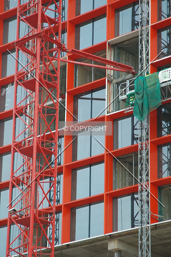 Tower crane connected with building's structure