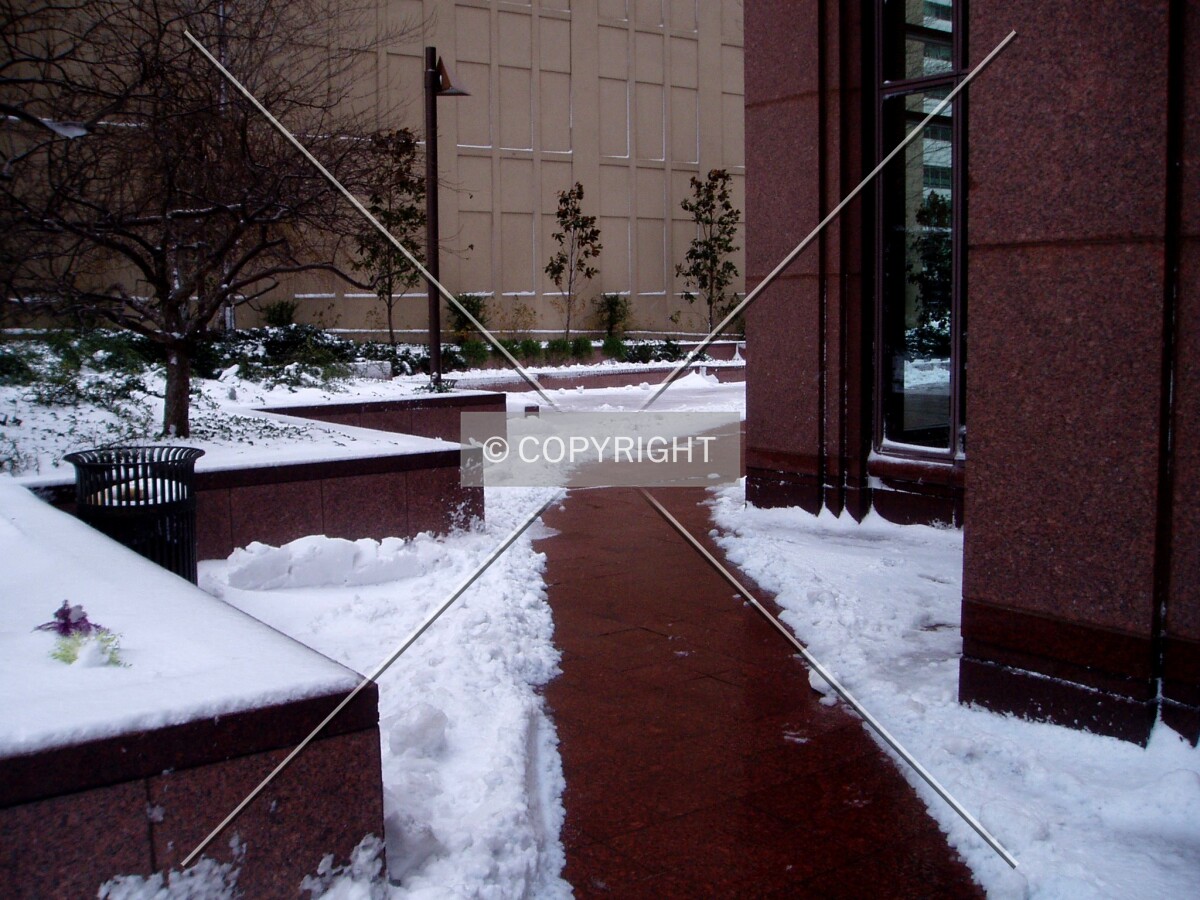 A snowy path around the northeast corner of the base