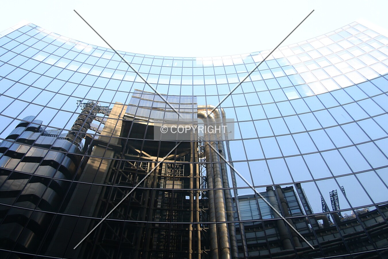 Looking up the west side from Lime Street showing a reflection of the Lloyd's Building