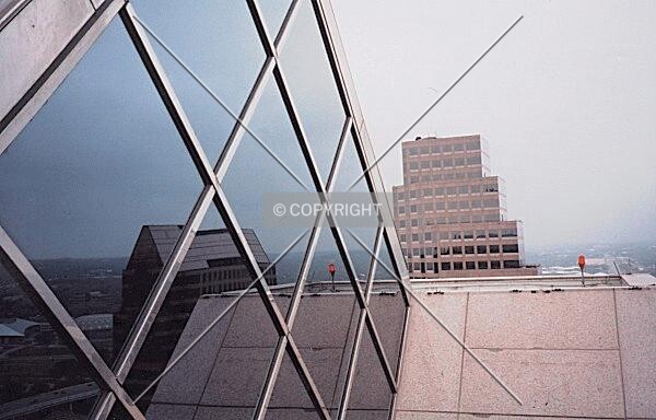 Glass reflections on roof 287 feet high