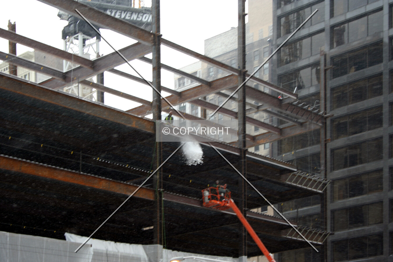 Shoveling snow off the 4th floor deck