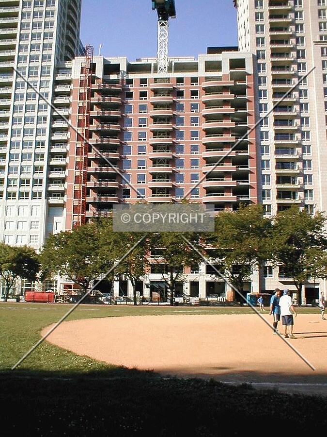 The site is hemmed in between two other high-rise condominiums in the same master project