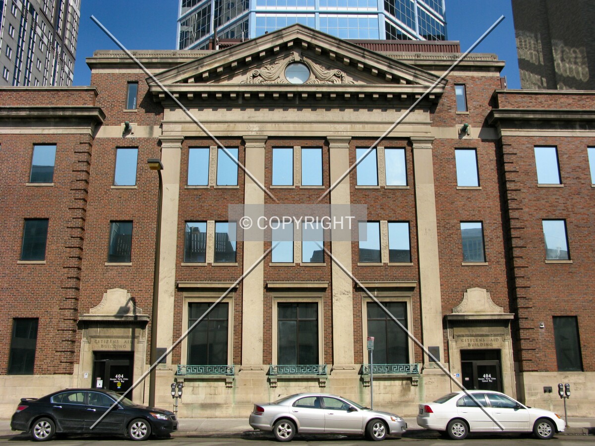 Main entrance elevation from across 8th Street South