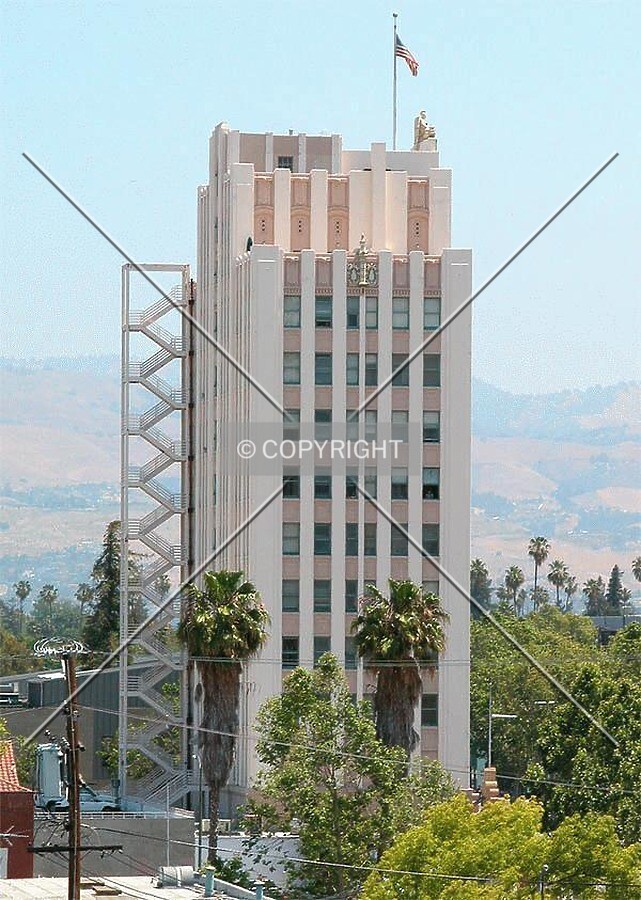 Side view with fire escape stairs at rear