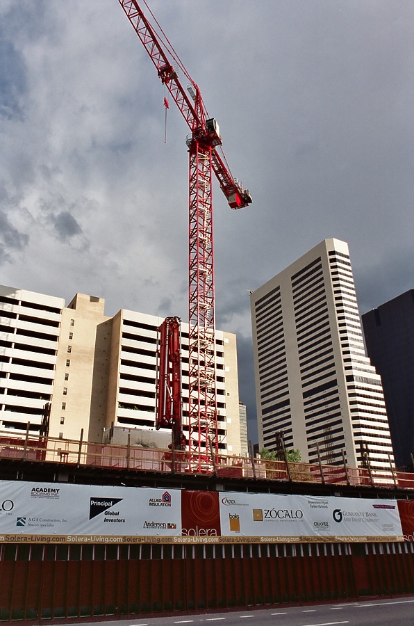 View of the tower crane near sunset