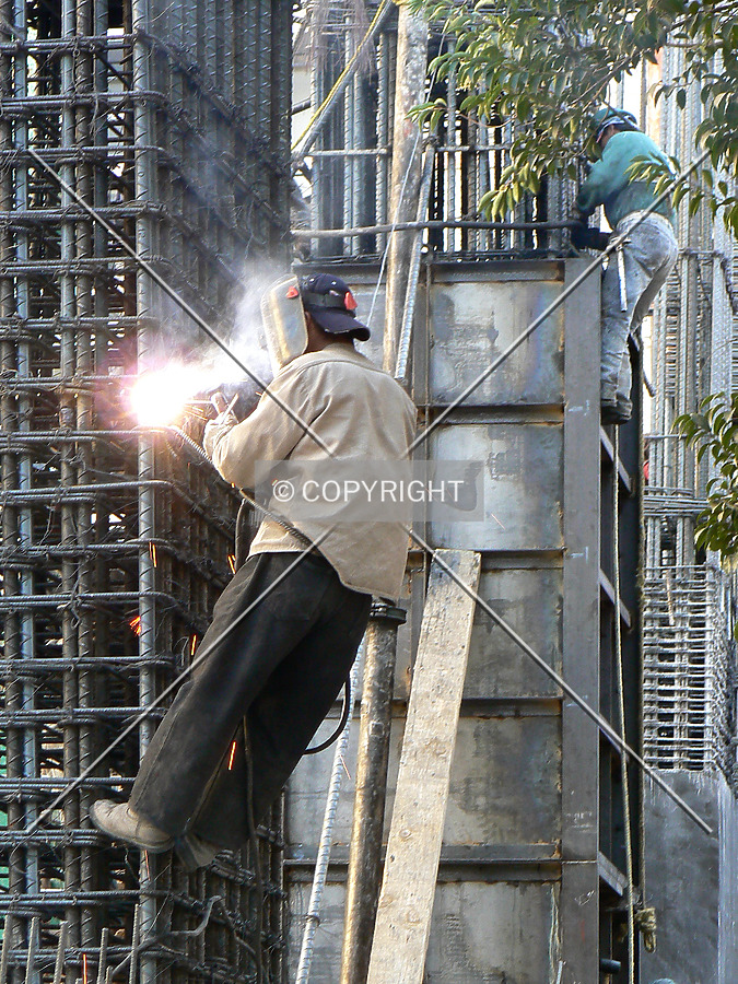 Men working on the columns
