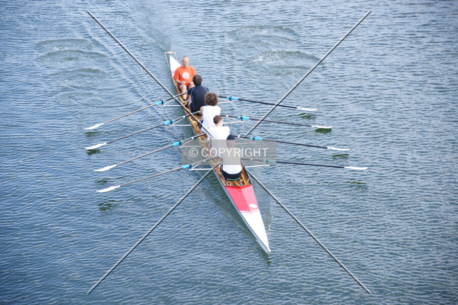 Oarsmen in a boat
