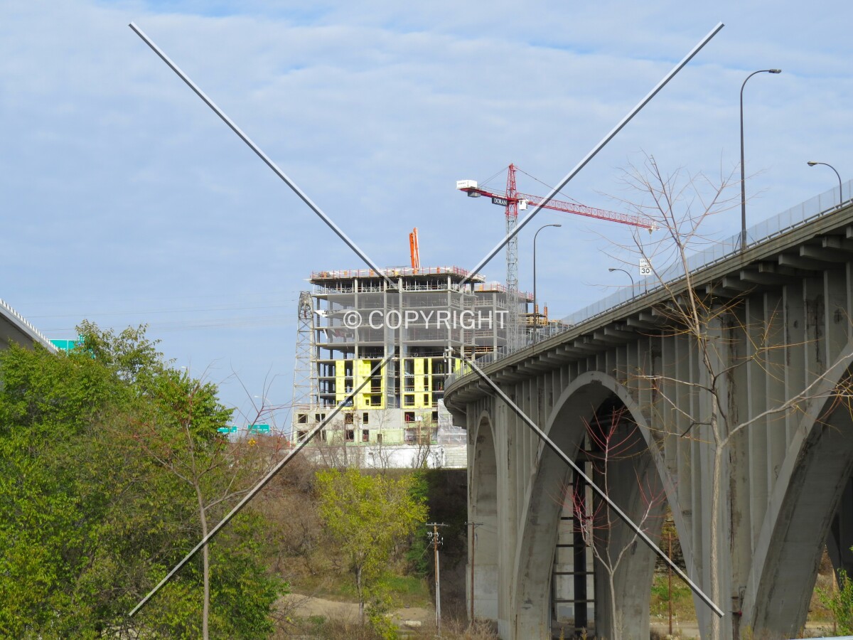 View to the northeast from West River Parkway, with the 10th Avenue Bridge