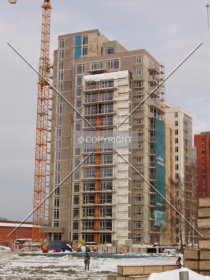 Southwest view across construction site of "Fortuna"
