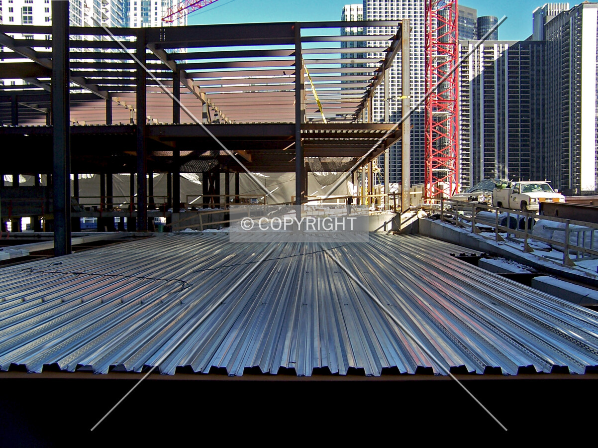 Steel decking in place for the pouring of the concrete slab, forming the first floor of the retail podium over the electrical substation