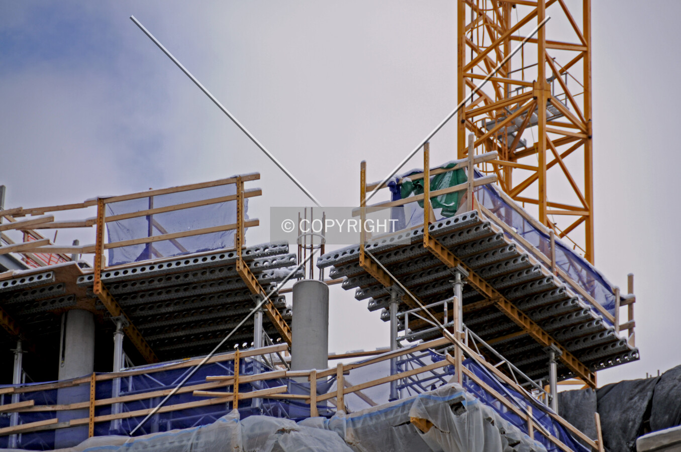 Columns and temporary decking at the top of the current structure