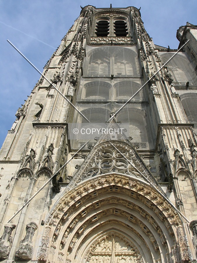 Looking up the northern tower from the western façade
