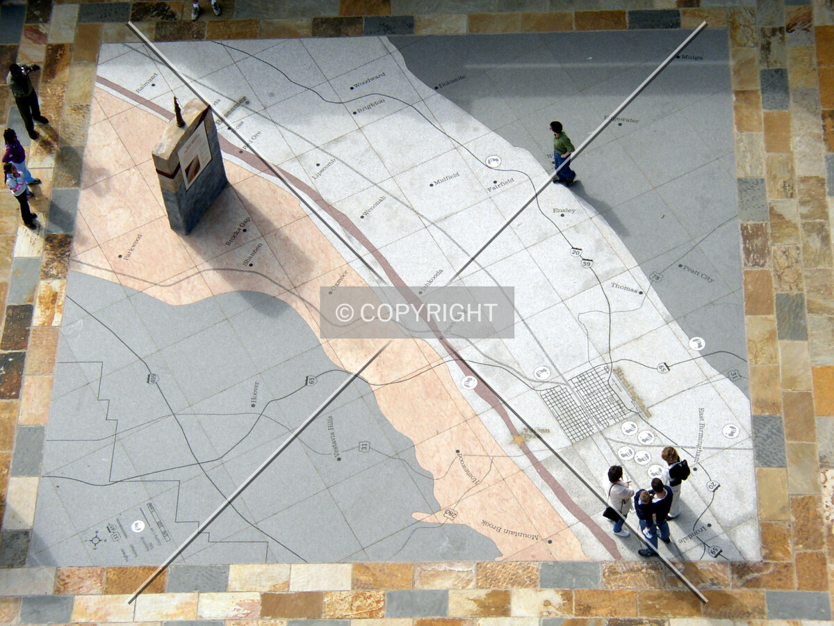 Looking down on a map of Birmingham adjacent to the pedestal