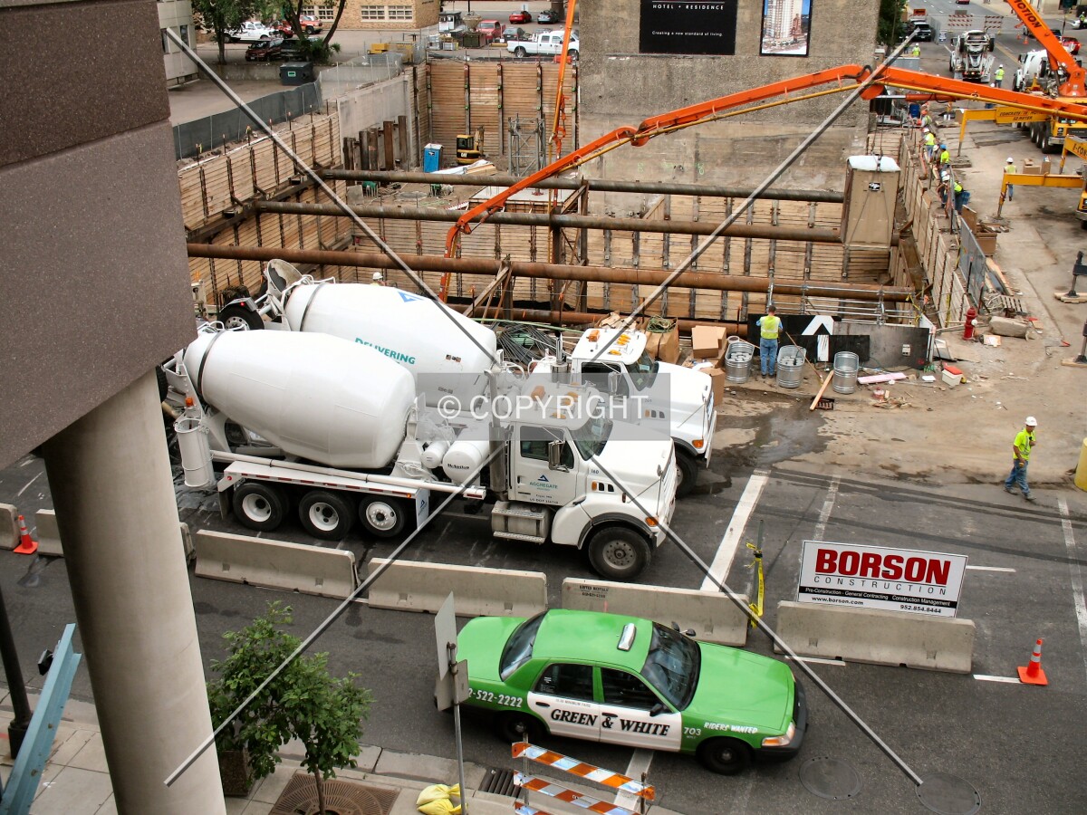 Unloading concrete along 11th Street South