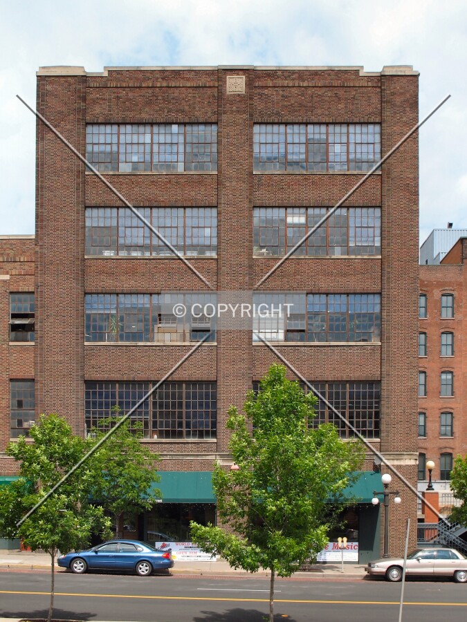 Full front elevation, from across East 4th Street