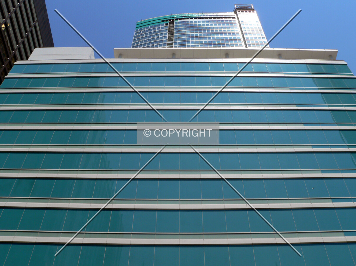View up the southern face of the parking structure with the tower in the background