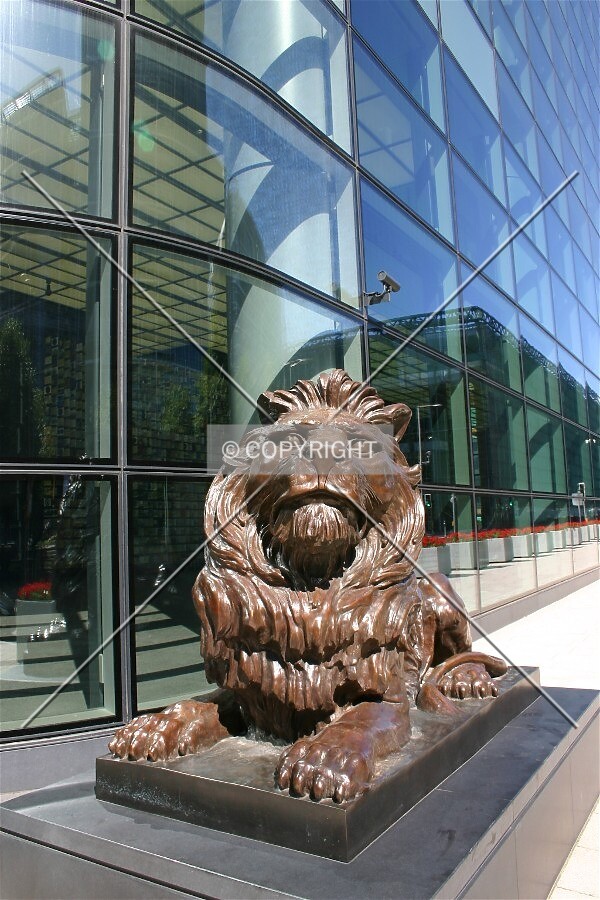 One of two lions which guard the entrance to the tower
