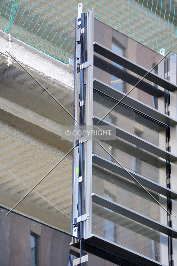 Close up view of the façade being under construction