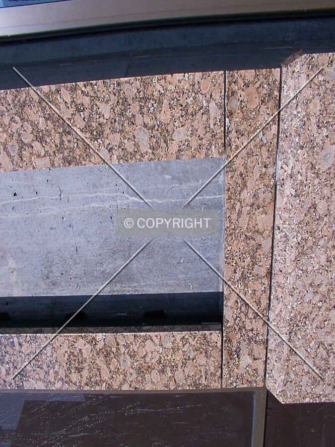 Detail of granite cladding at the base