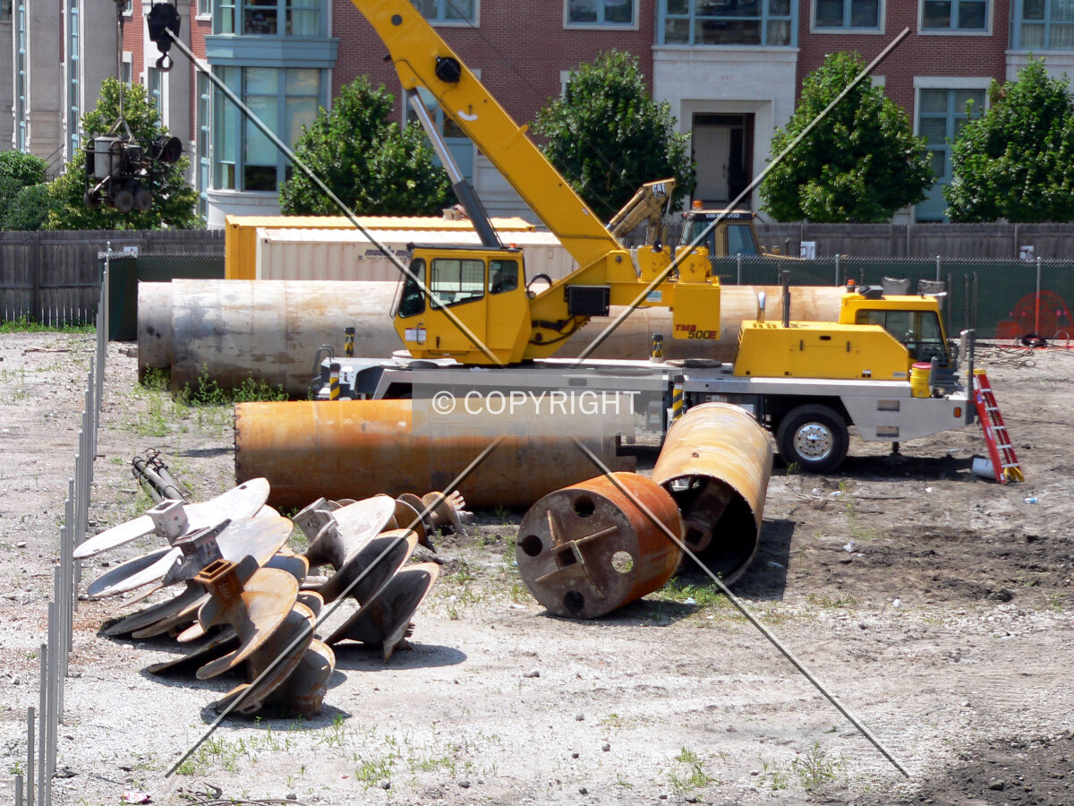 Caisson augers, tops and other construction equipment