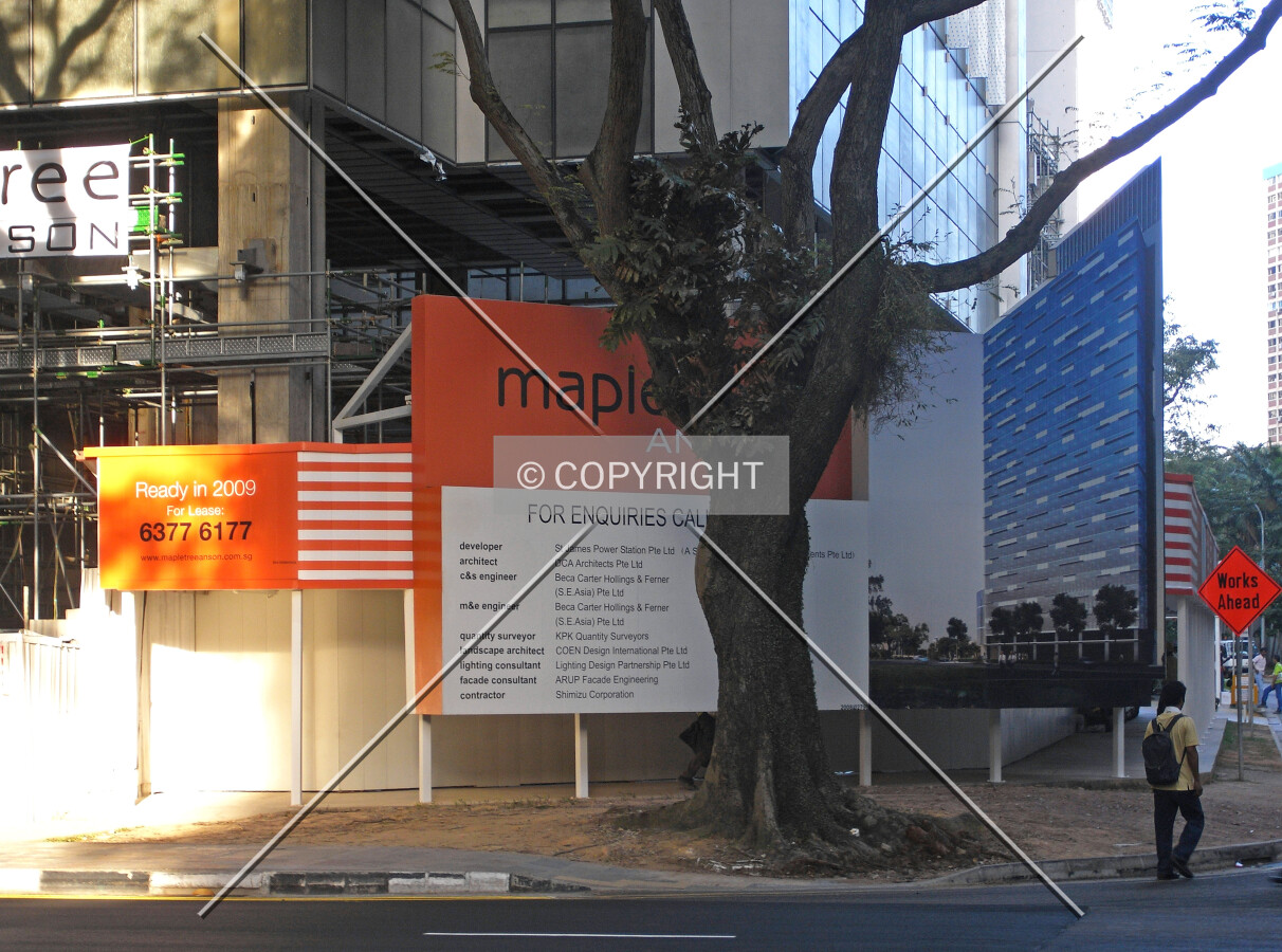 Project information displayed on the construction site fence