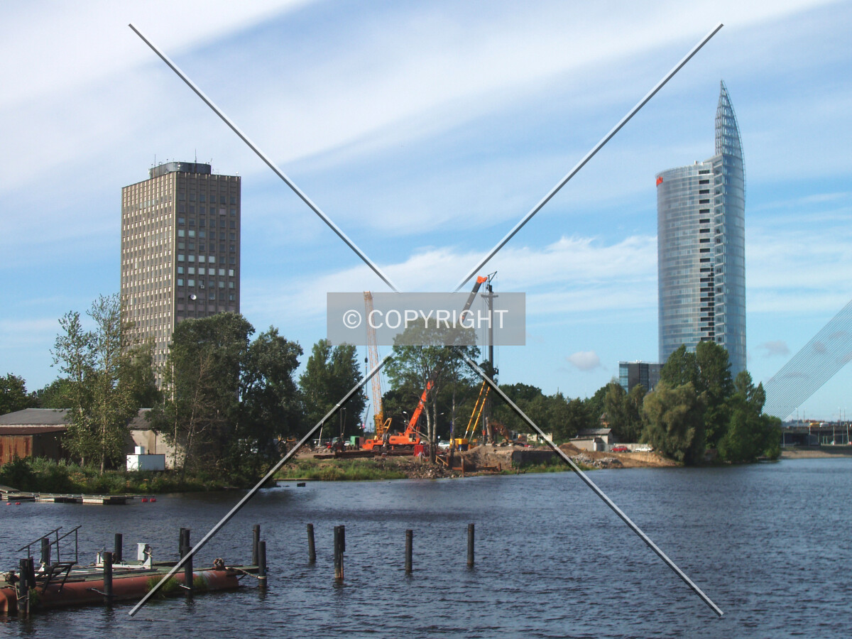 View from Daugavgrivas Street with Preses Nams on the left side and Hansabanka Central Office on the right side of construction site