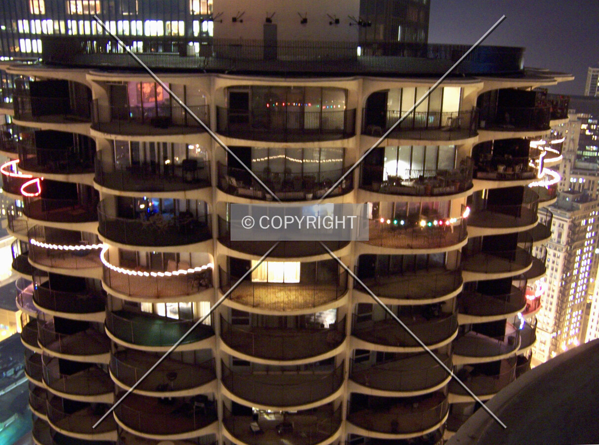 Top of the east tower viewed from the roof of the west tower at night