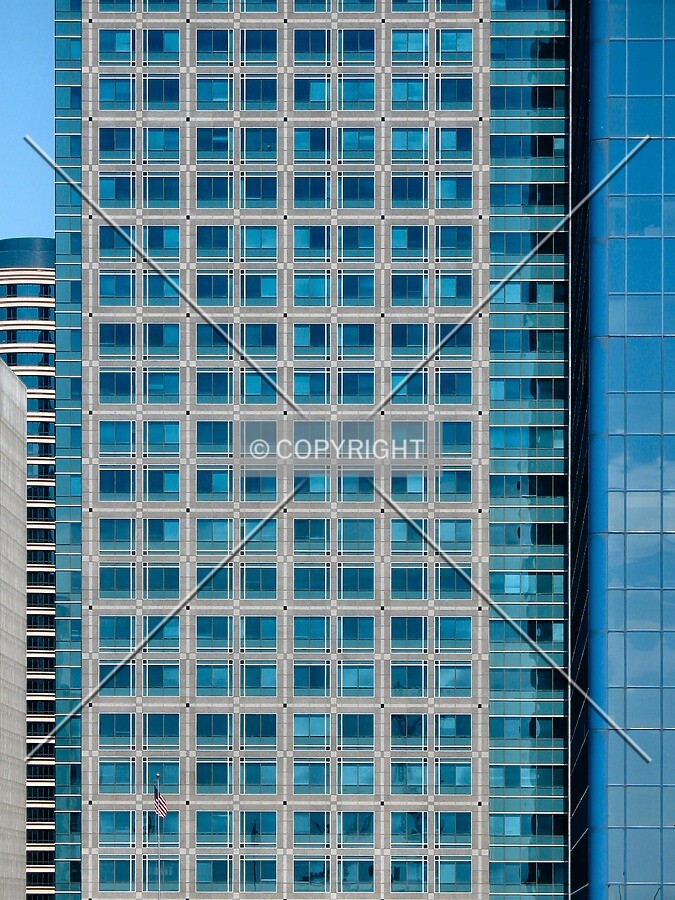 Section of the south facade from the Leamington Ramp, framed by Fifth Street Towers and the Campbell Mithun Tower