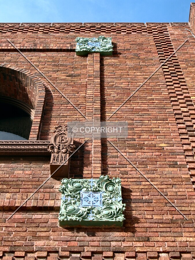 Terra cotta detail on the rear office building