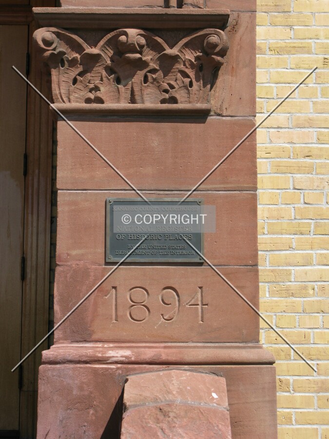 Cornerstone and National Register plaque on Lake Superior sandstone