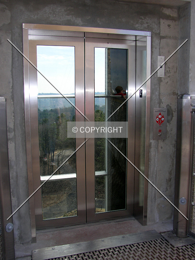 Glass elevator at the top of the pedestal