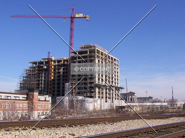 View with demolition of Soldier Field in background