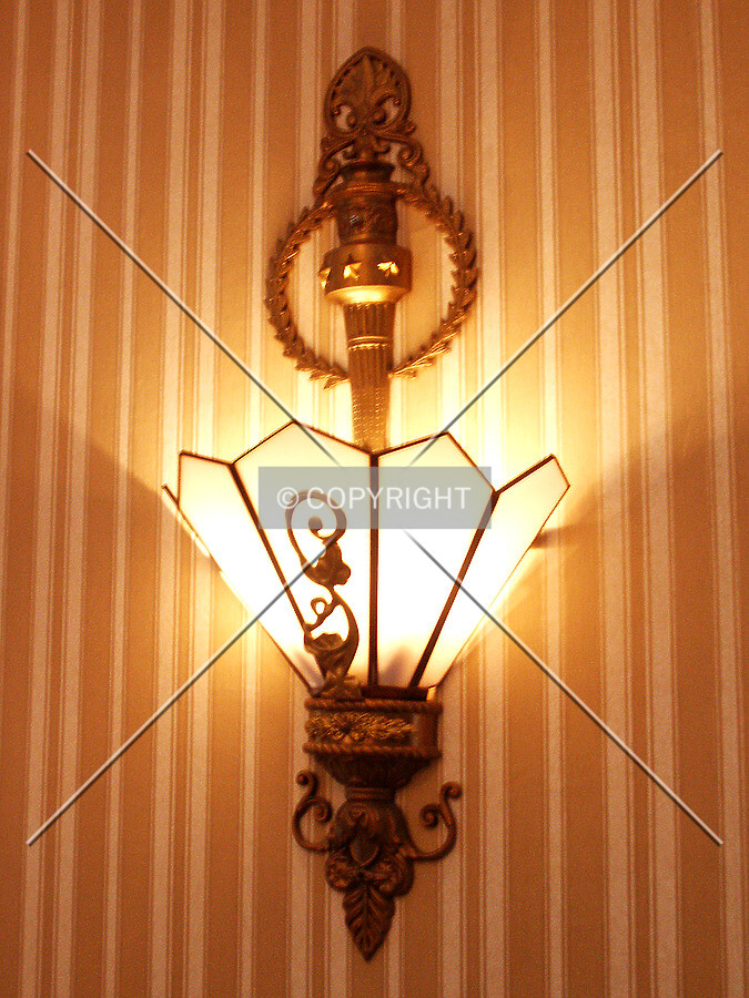 Wall lamp near the south stairway in the lobby