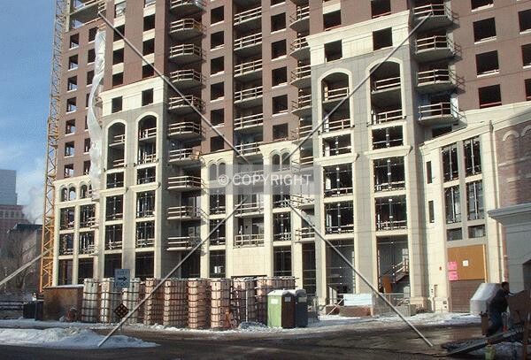 Lower floors with construction materials, from Grant Street