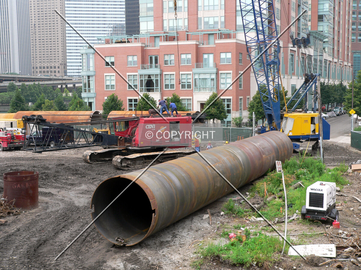 A large caisson rock can waiting to be installed