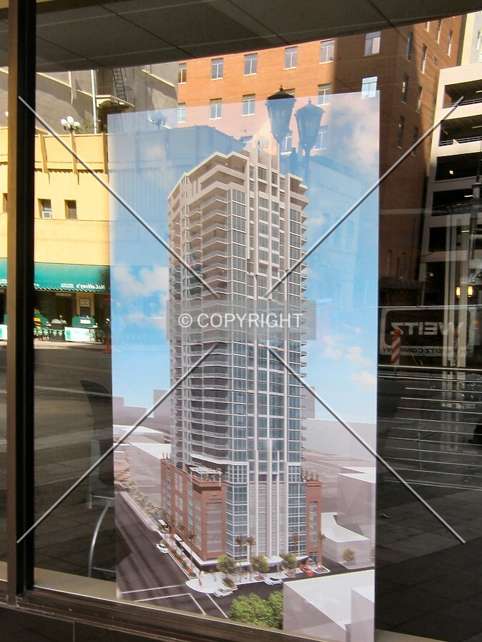 Updated rendering in Sales Center across Monroe Street, reflecting the construction site