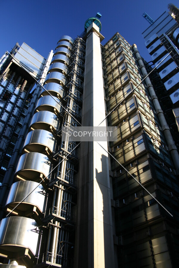 Looking up at the north façade from Leadenhall Street at sunset