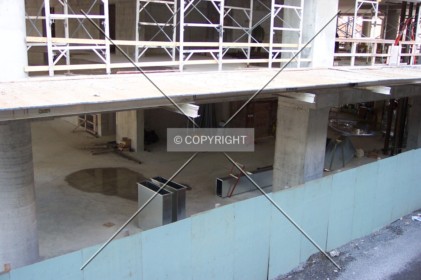 Looking down into the alleyway on the east side of the site