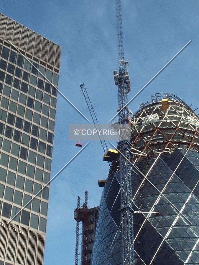 Cranes working high above the crowded London cityscape (24/01/03)